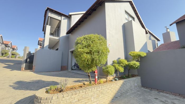 4-Bedroom House For Sale in Wild Olive Estate with garden, braai room, and loft.