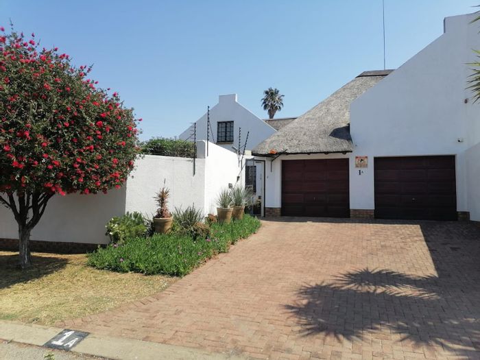 For Sale: House in Van Riebeeck Park with pool, garden, and 4 bedrooms.