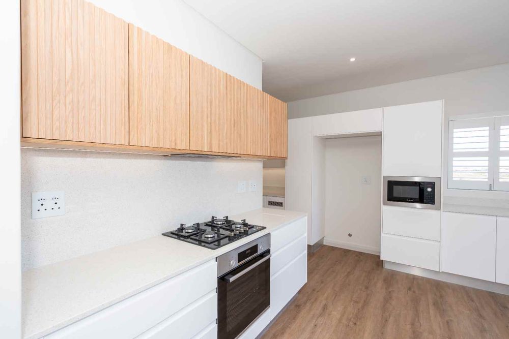 Kitchen with large space for Fridge