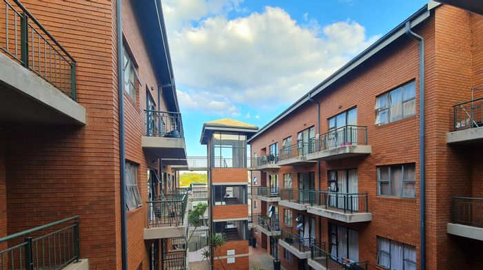 1-Bedroom Apartment to Rent in Richmond with balcony, secure complex, near universities.