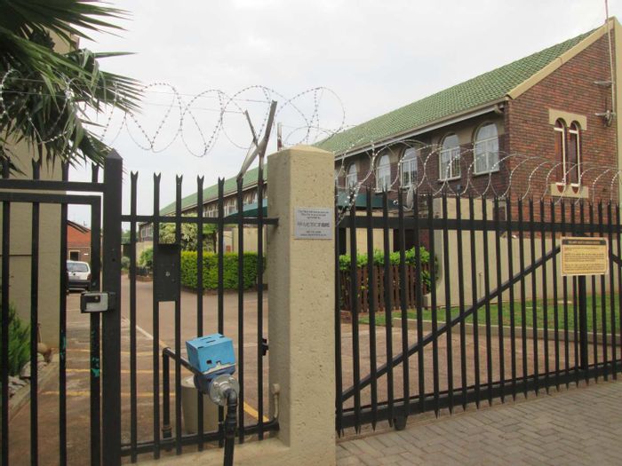 For Sale: 2-Bedroom Apartment in Pretoria North, near shopping and amenities.