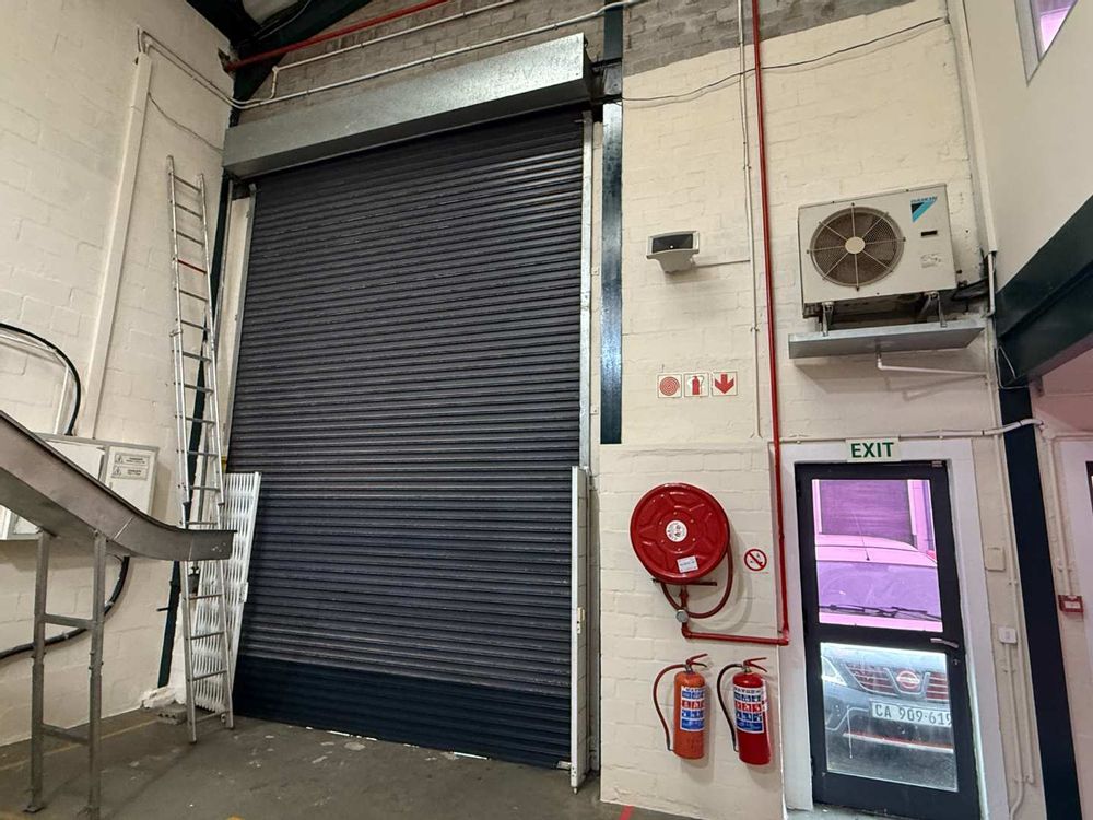 Newly serviced roller shutter door