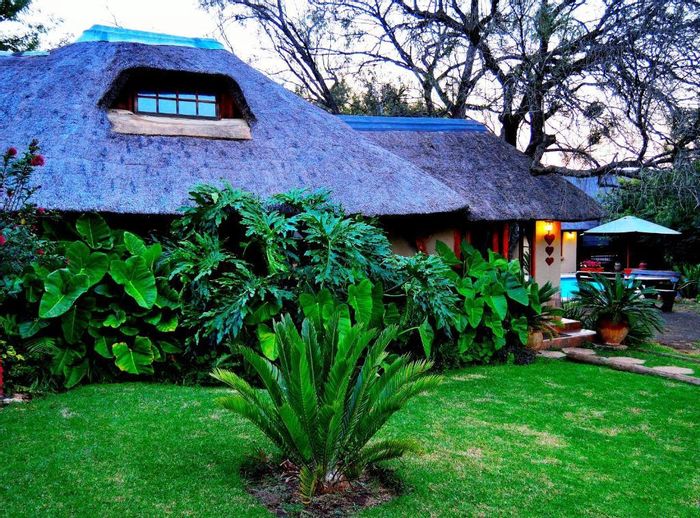 For Sale: 900-hectare game farm in Rustenburg Central with lodge, wildlife, and amenities.