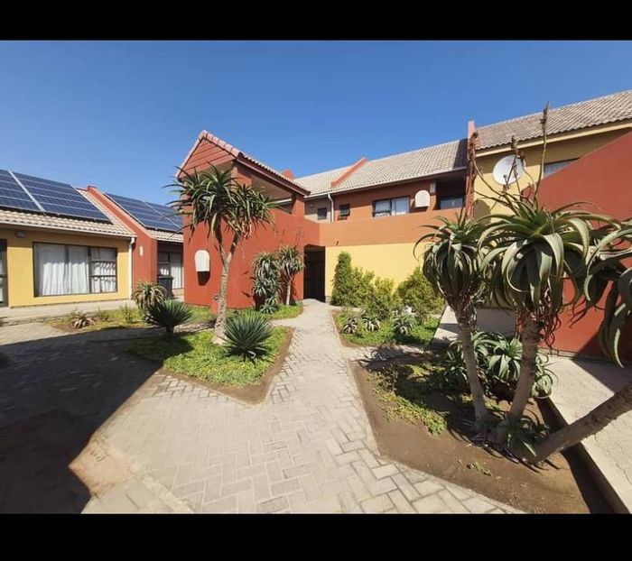 Central Swakopmund Apartment for Sale: 2 Beds, Communal Braai, Store Room Available!