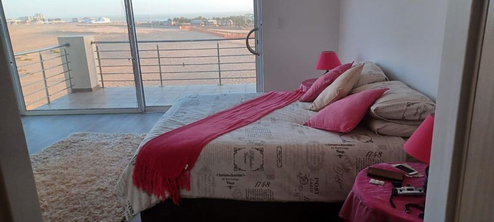 Main bedroom with own balcony and views