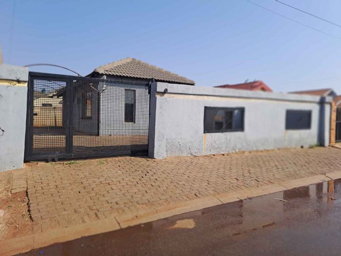 For Sale: House in Protea Glen with open-plan living, two bedrooms, and secure yard.