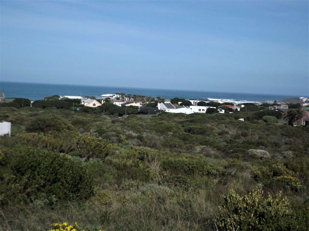 Permanent Sea View (directly to the front - with Dyer Island at the back) - as from our Plot (on a hill). Dyer Island is the breeding place of the Great White Shark.
