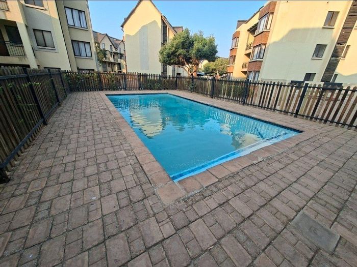 2-Bedroom Apartment in Montana AH For Sale, features pools, braai areas, and amenities.