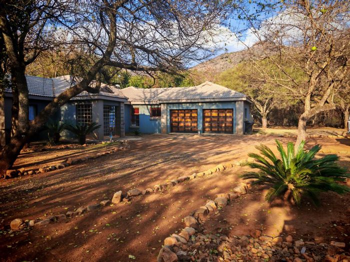 House for Sale in Burgersfort Central: Riverfront, 3 beds, outdoor braai, spacious living.
