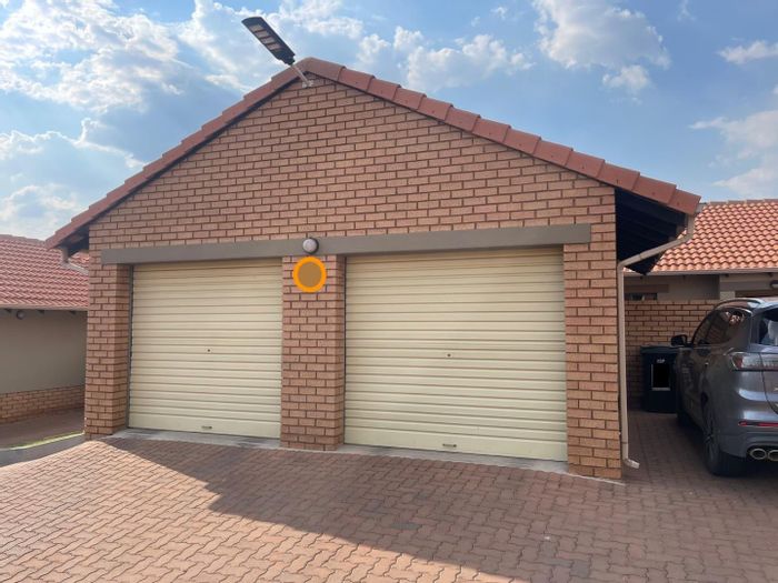 For Sale: Mooikloof Ridge Townhouse with park access, double garage, and garden service.