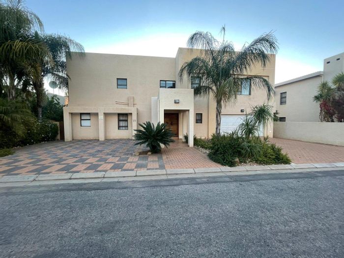 4-Bedroom Apartment To Rent in Windhoek Country Club with pool and garden service.