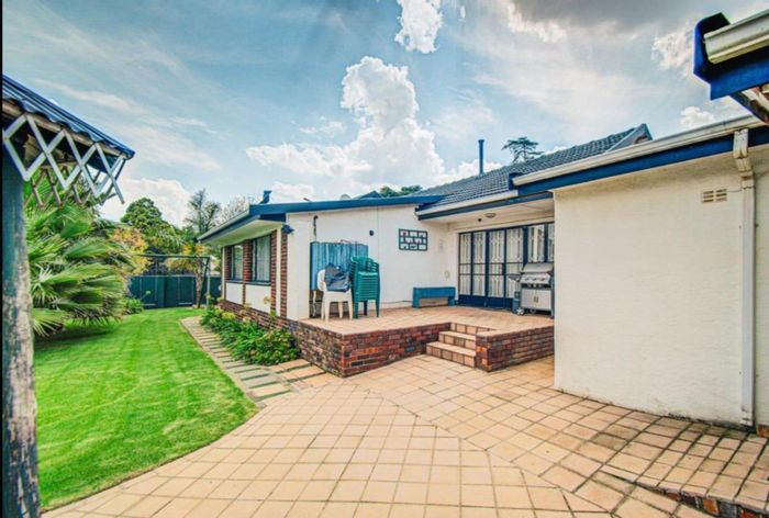 For Sale: House in Parkdene with garden, braai area, study, and double garage.