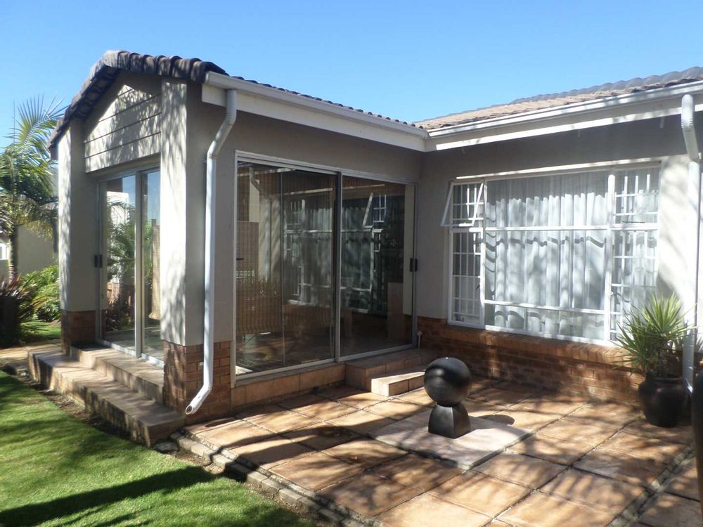 enclosed covered patio with 3 sliding doors