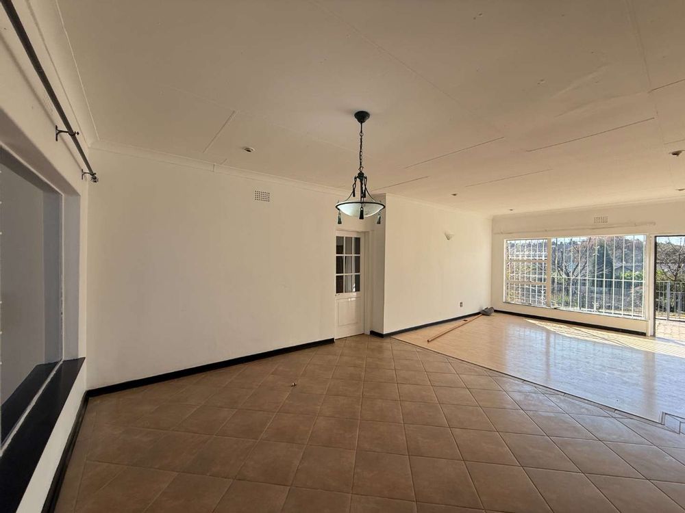Huge Lounge & Dining Room area leading to own patio