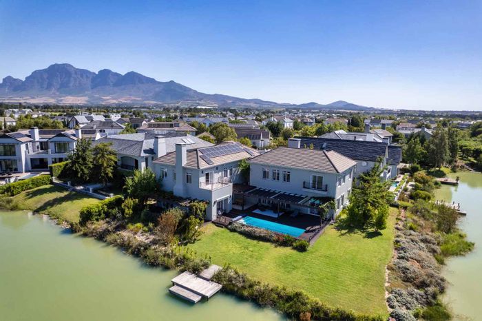 Lakefront house for sale in Val De Vie Estate with pool and solar system.