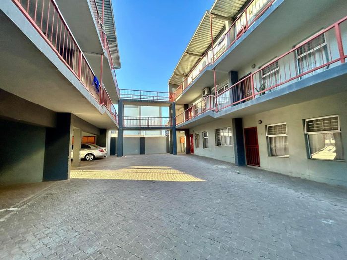 For Sale: Apartment in Otjomuise Ext 4 with pool, gym, and parking.