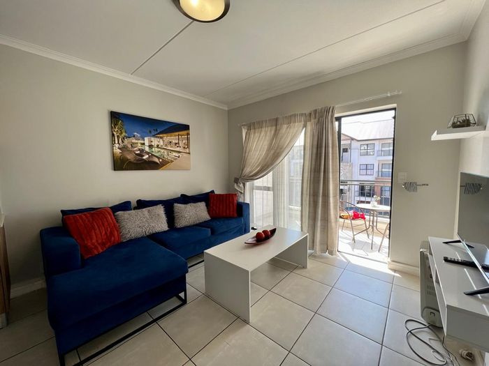 For Sale: Apartment in Blyde Riverwalk Estate with balcony, gym, and lagoon access.