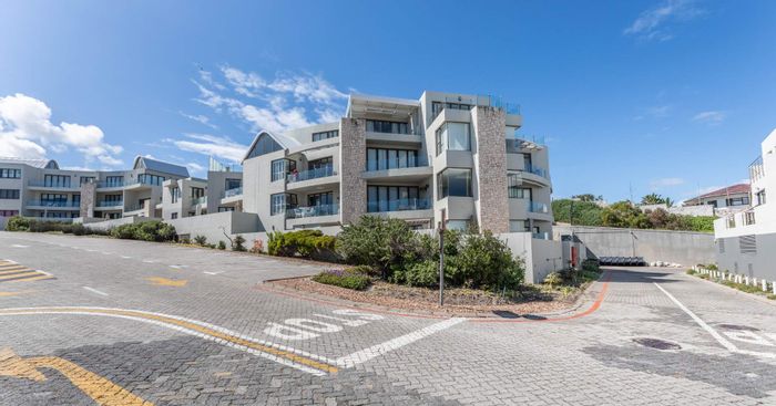 Big Bay Apartment For Sale: 2-bed, sea views, Airbnb-ready, large balcony.
