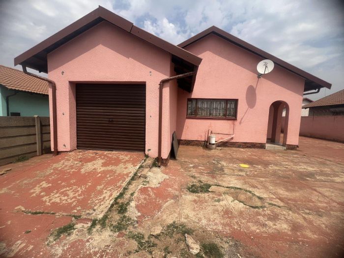 3-Bedroom House for Sale in Likole Ext 1 with Garage and Spacious Reception Areas.