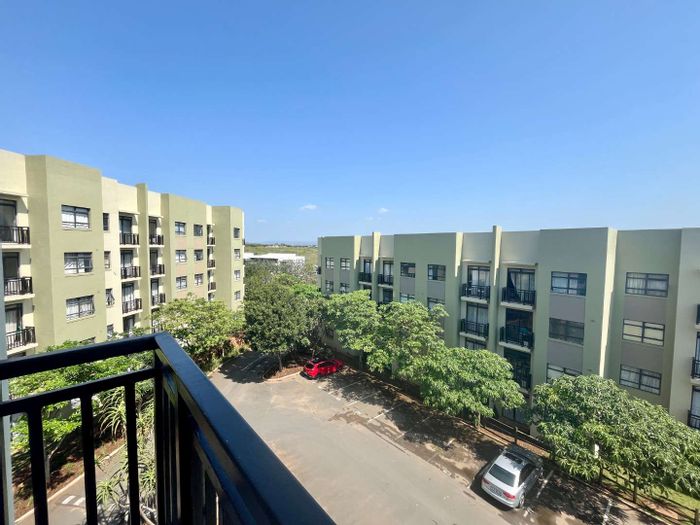 For Sale: Apartment in Umhlanga Ridge with secure access, furnished, and revamped kitchen.