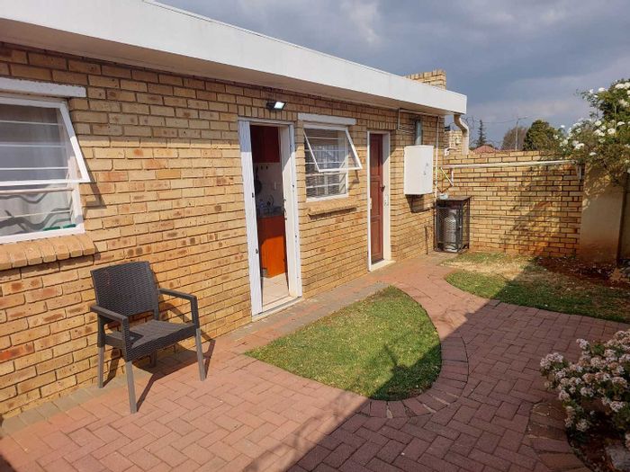 Pet-friendly townhouse in Alberton Central for sale with private garden and low levies.