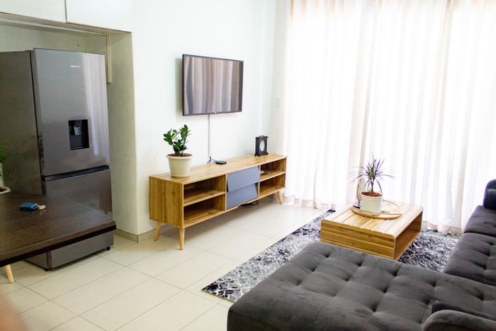 1-Bedroom Apartment To Rent in Windhoek Central, includes utilities and parking.