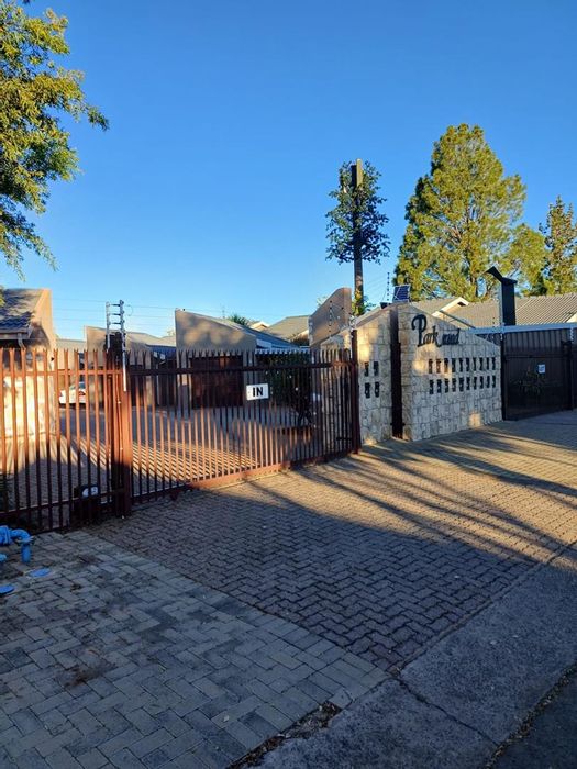 Townhouse for Sale in Fichardt Park: 2 Bedrooms, Garage, Garden, Prepaid Utilities.