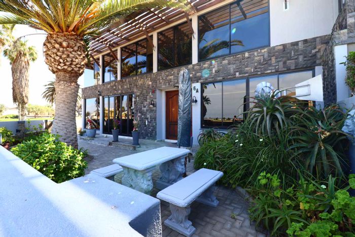 For Sale: Spacious Vineta house with ocean views, multiple living units, and garage.