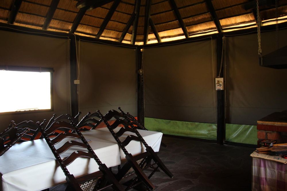 Outdoor/ enclosed entertainment room with indoor BBQ