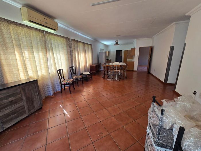 House For Sale in Aquapark: 3 Bedrooms, secure village, spacious living, ample parking.