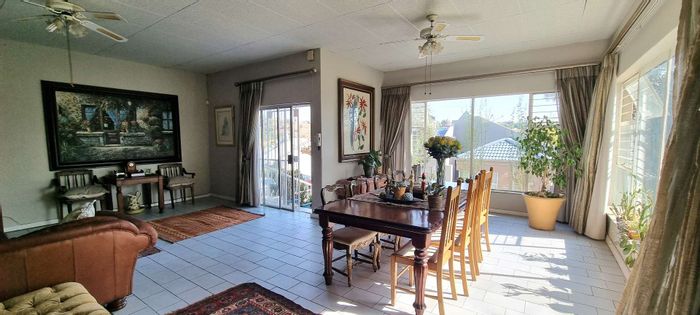 Spacious townhouse in Helicon Heights for sale, features pool, study, and garage.