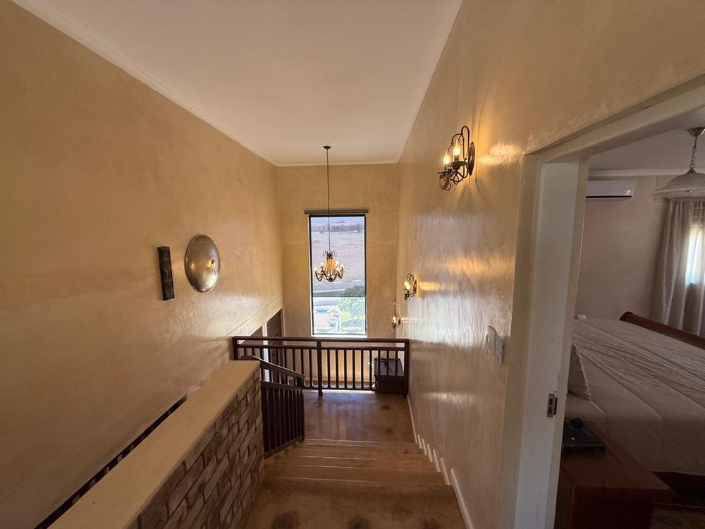 Stairway and main bedroom