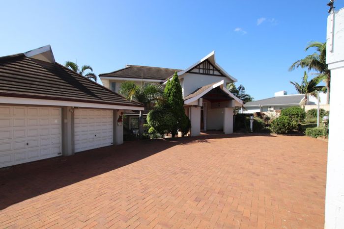 La Lucia House For Sale: Spacious family home with entertainment areas and security features.