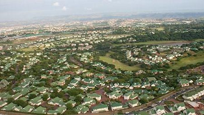 For Sale: Townhouse in Mount Edgecombe Central with 4 ensuite bedrooms and garden.