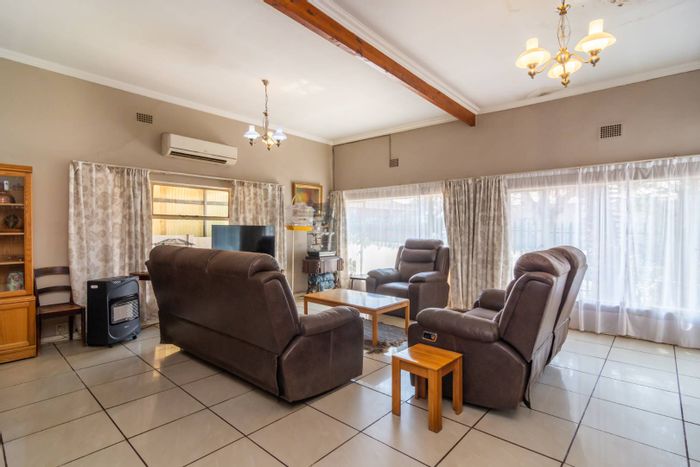 Krugersdorp West House For Sale: Open plan living, study, ample parking, garden.