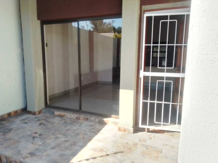 For Sale: Townhouse in Okahandja Central with braai area and conversion potential.