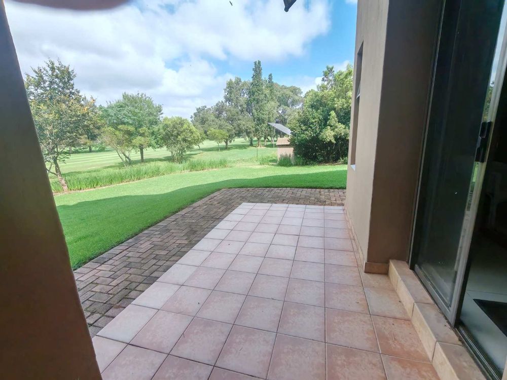 Sliding door open to the golfcourse
