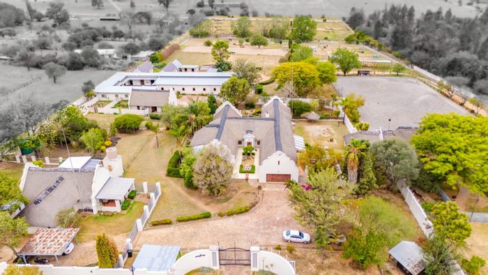 For Sale: Midrand Central Farm with equestrian facilities, cottages, and income potential.