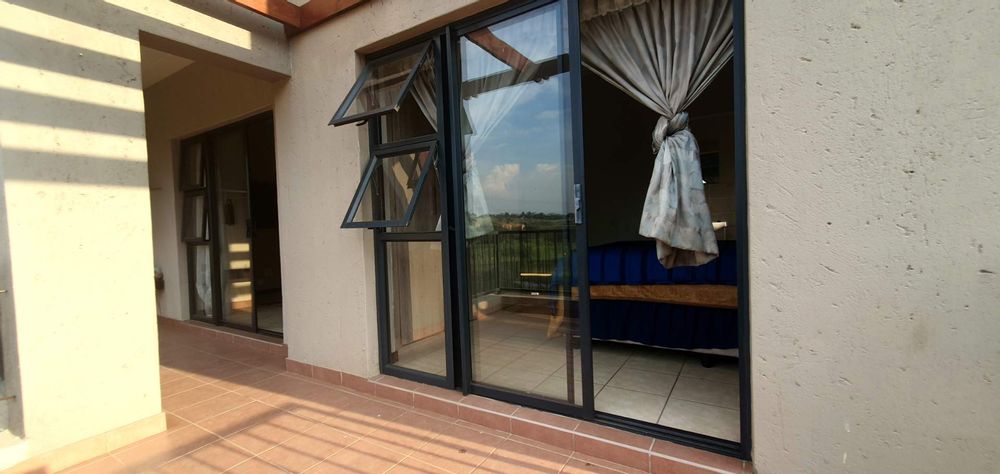 Balcony view of bedroom from sliding door