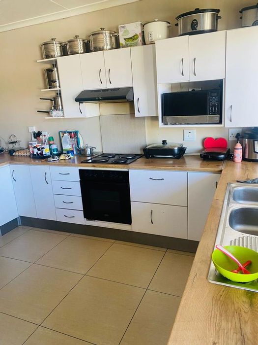 For Sale: Rocky Crest Apartment with balcony, communal braai, and 24-hour security.