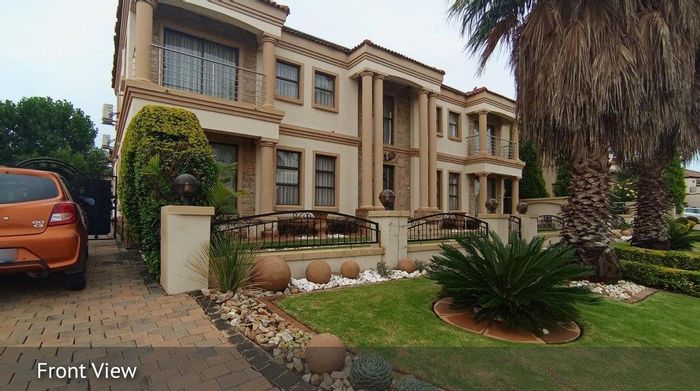 For Sale: House in Blue Valley Golf Estate with 5 bedrooms, study, and garage.