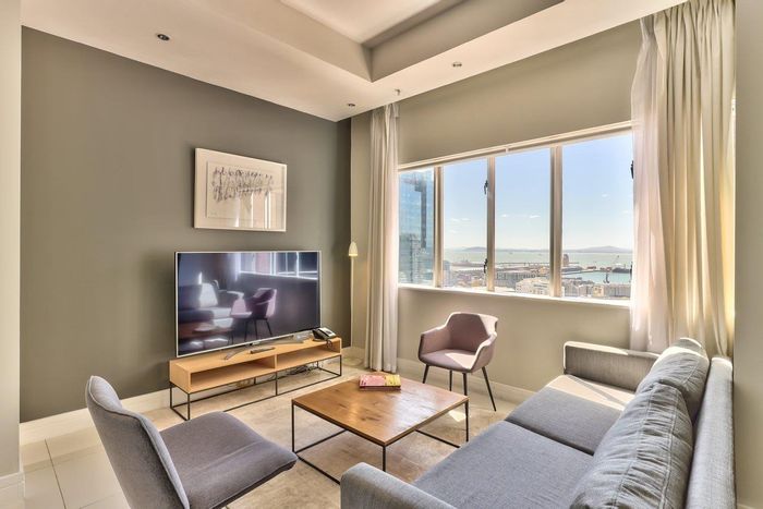 For Sale: Apartment in Cape Town City Centre with 5-star amenities and harbour views.