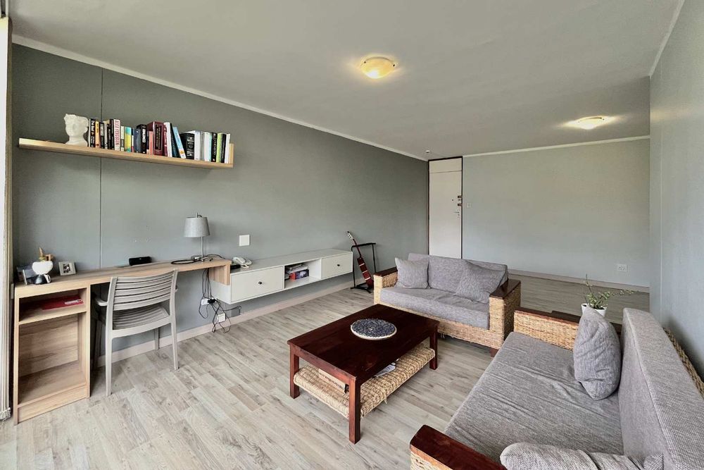 Lounge with built-in TV unit, desk and floating shelf