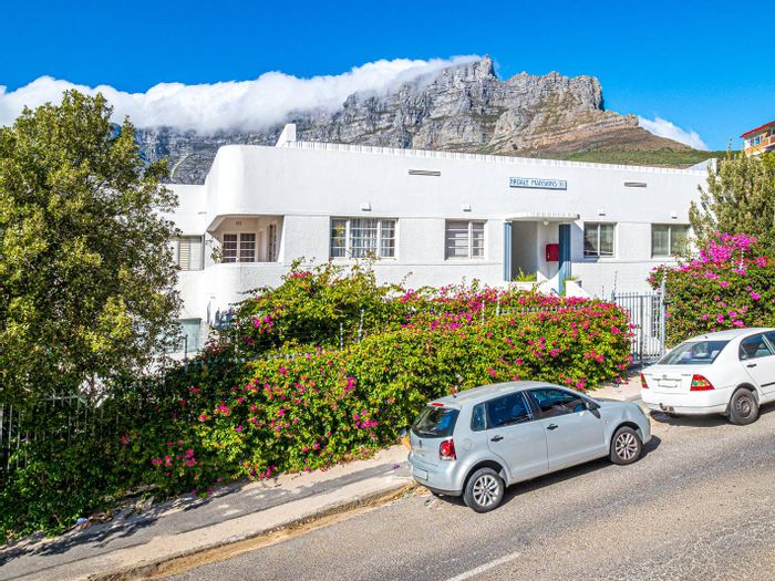 Charming Gardens Apartment For Sale: Two bedrooms, secure parking, communal gardens.