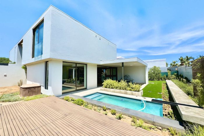 For Sale: Townhouse in Hawaan Forest Estate with pool, garage, and nature trails.