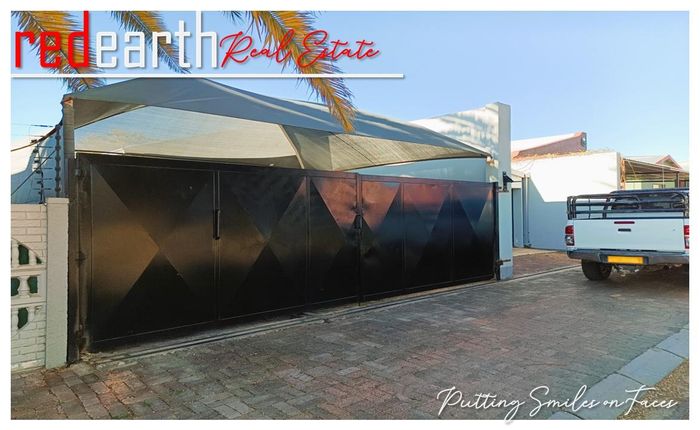 Cimbebasia House For Sale: 2 bedrooms, indoor entertainment, double garage, private garden.