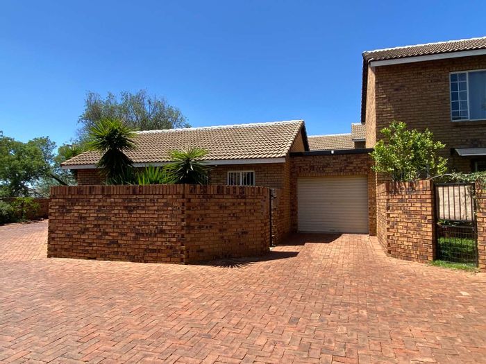 Highveld Townhouse To Rent: 2-bed simplex, wrap-around garden, secure complex, pet-friendly.