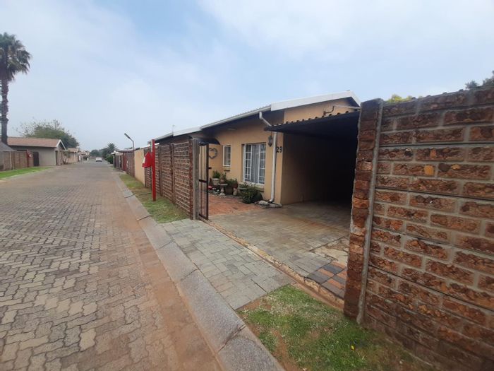 For Sale: Townhouse in Elspark with private garden, 24-hour security, and pool.