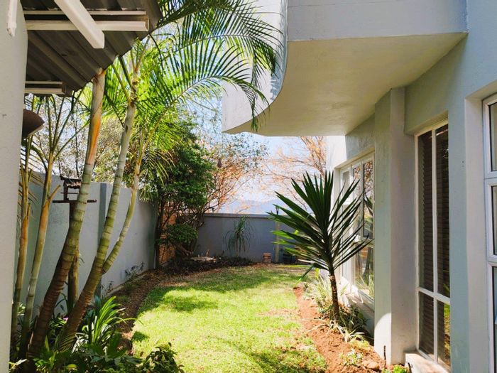 For Sale: Townhouse in Nelspruit Ext 39 with garden, BBQ, and two living rooms.