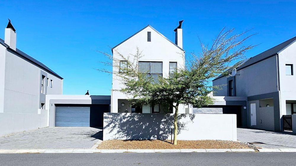 North facing, double storey, direct access automated double garage, additional parking for 2 vehicles on the driveway.